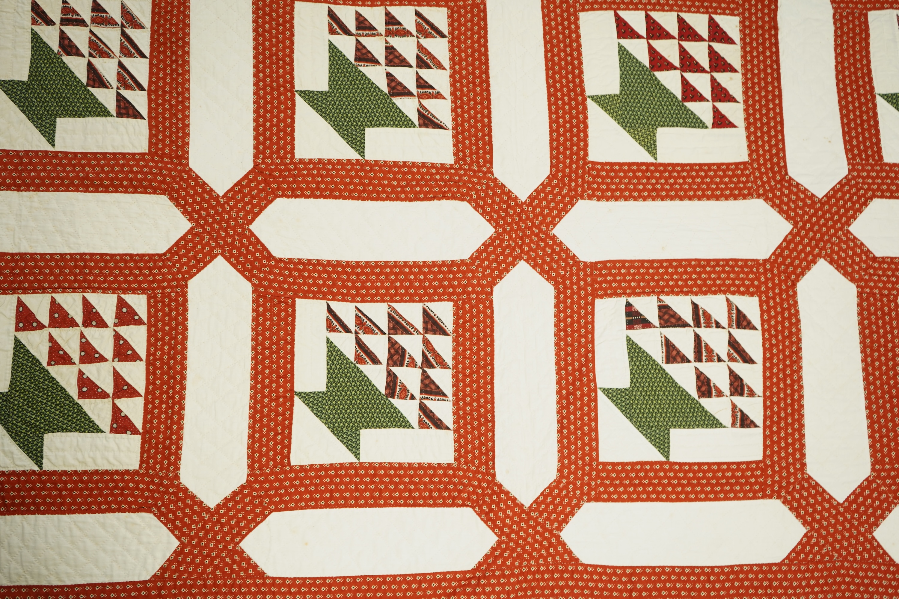 A handsome mid 19th century American ‘Basket’ hand pieced and hand quilted bed cover. An unlaundered Civil War quilt. The reverse side a printed quilted cotton. This quilt purchased in Virginia. 226cm x 168cm. Condition